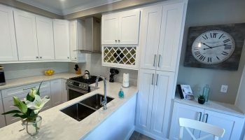 White kitchen cabinets with pantry